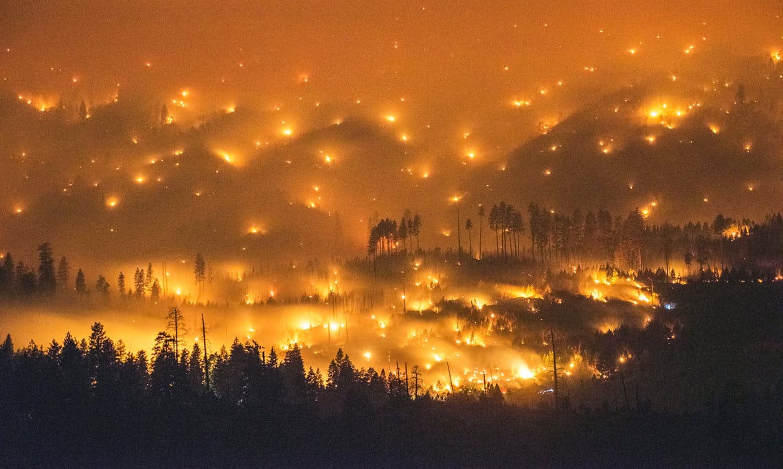 The 2014 El Portal fire burning near Yosemite National Park, California. Scientists have warned that rising global temperatures will lead to more wildfires in Yosemite and elsewhere. Photograph: Stuart Palley/EPA  theguardian.com - Peter Brannen - September 9th 2017