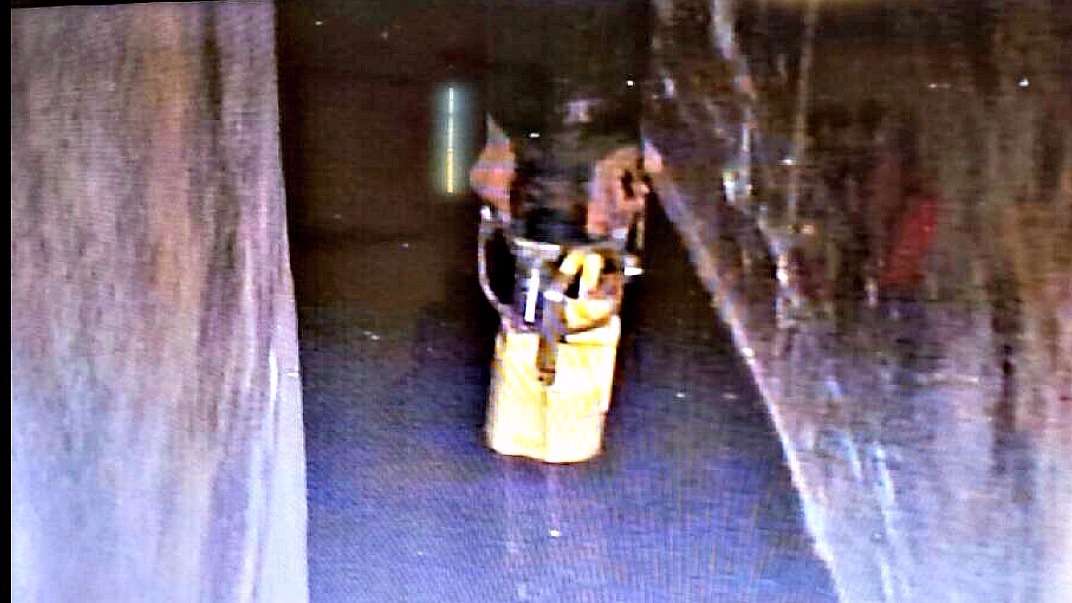 A photo from April 17, 2016 shows liquid covering the floor of the space between the inner and outer shells of a massive tank holding nuclear waste at the Hanford Site in eastern Washington. The tank has been leaking since at least October 2011. (Photo: KING) 