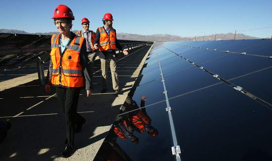 U.S. Secretary of Interior Sally Jewell, left, tours the plant during the power-on ceremony at Desert Sunlight Solar Farm in Desert Center, Calif., on Feb. 9, 2015 