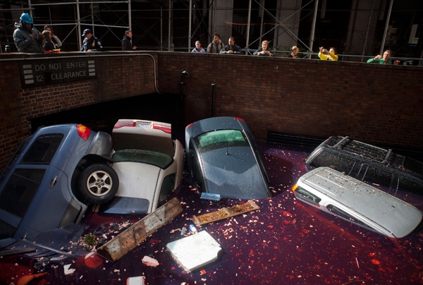 Car sit in a flooded tunnel after Hurricane Sandy in New York.