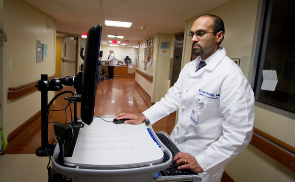 Dr. Vivek Reddy, a neurologist at the University of Pittsburgh Medical Center, also works on its digital records effort. Jeff Swensen for The New York Times